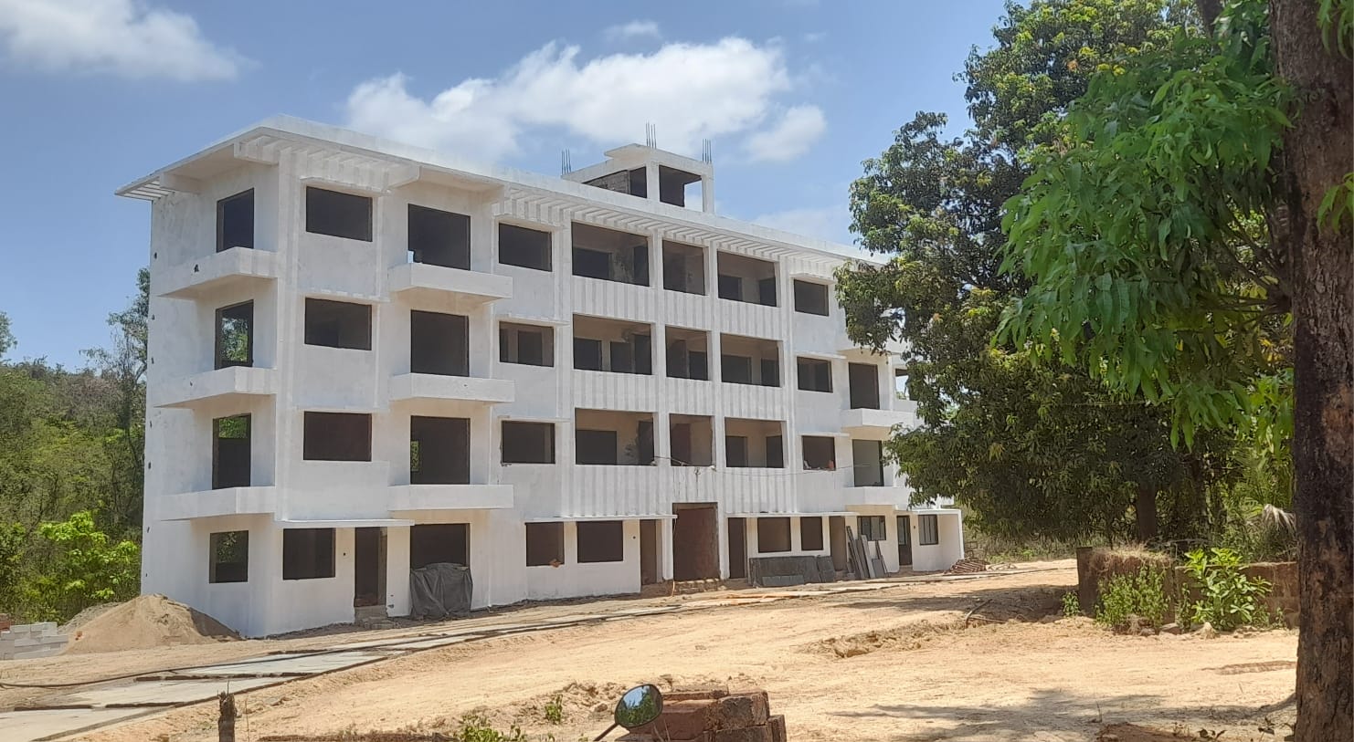 Actual on-site photo of Paradise Homes B Wing at Janavli near Kankavali, showing the building nearing possession