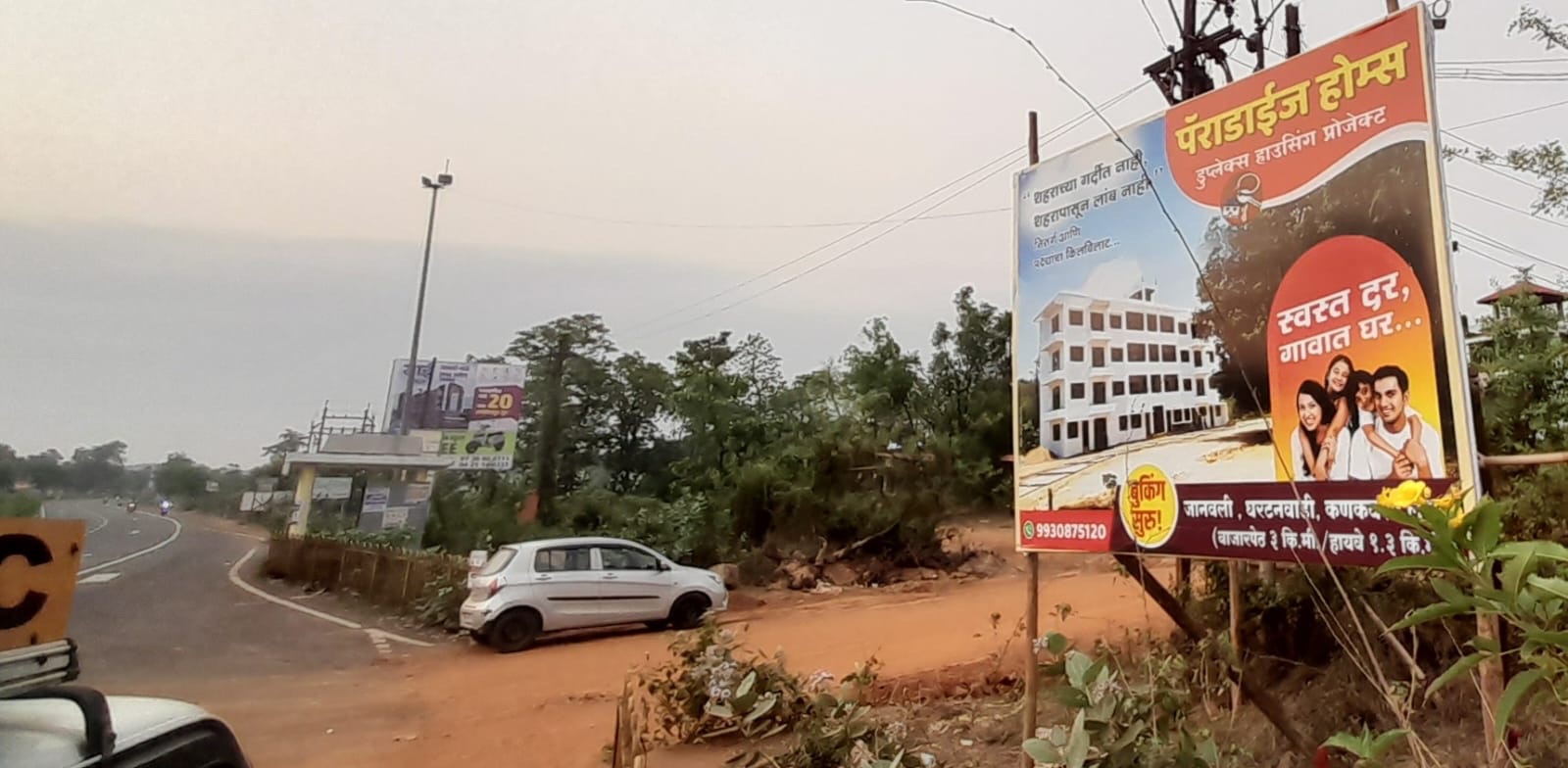 Paradise Homes billboard beside the Mumbai-Goa highway junction near Kankavli
